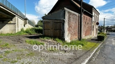 Garages et terrain constructible