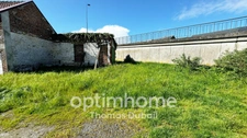 Garages et terrain constructible