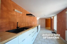 Maison individuelle bâtie sur 700m² - 3 voire 4 chambres, garages, remise et jardin clos