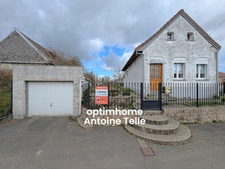 Exclusivité - REUMONT - Maison individuelle à conforter avec garage & jardin clos sur 860m² 