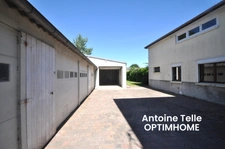 Maison individuelle bâtie sur 700m² - 3 voire 4 chambres, garages, remise et jardin clos