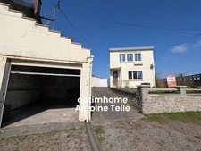 Maison individuelle bâtie sur 700m² - 3 voire 4 chambres, garages, remise et jardin clos