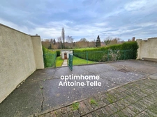 Le Cateau - Maison semi-individuelle à double accès avec garage, devanture & jardin clos sur 960m².