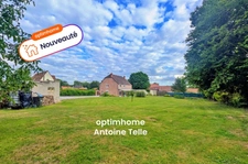 Élégante & attrayante bâtisse de village modernisée au cadre verdoyant avec un garage double & sans vis à vis à Poix du Nord