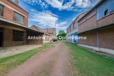 Proche Le Cateau 59360 - Maison individuelle avec nombreuses dépendances & jardin sur 1700m² 