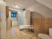Le Cateau - Maison semi-individuelle à double accès avec garage, devanture & jardin clos sur 960m².