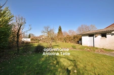 Exclusivité - REUMONT - Maison individuelle à conforter avec garage & jardin clos sur 860m² 