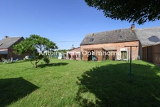 Exclusivité - Maison semi-individuelle avec garage & jardin clos à Saint Benin 59360