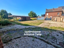 Le Cateau - Appartement en RdC avec garage, parking privatif, dépendance aménagée & jardin clos.