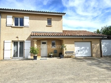 SAVIGNEUX (01480) – Maison familiale 125 m² – 3 chambres – Véranda – Jardin – Garage double