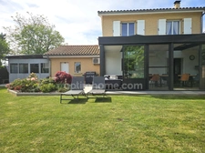 SAVIGNEUX (01480) – Maison familiale 125 m² – 3 chambres – Véranda – Jardin – Garage double