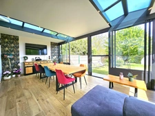 SAVIGNEUX (01480) – Maison familiale 125 m² – 3 chambres – Véranda – Jardin – Garage double