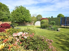 SAVIGNEUX (01480) – Maison familiale 125 m² – 3 chambres – Véranda – Jardin – Garage double