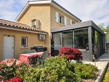 SAVIGNEUX (01480) – Maison familiale 125 m² – 3 chambres – Véranda – Jardin – Garage double