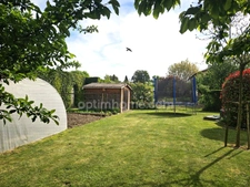 SAVIGNEUX (01480) – Maison familiale 125 m² – 3 chambres – Véranda – Jardin – Garage double