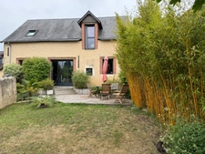Immeuble en centre ville de Parigné l’évêque 