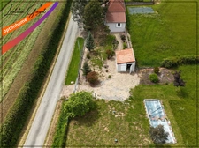Maison familiale avec vie de plain-pied et grand terrain à vendre à Souvigny