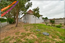 Maison familiale avec vie de plain-pied et grand terrain à vendre à Souvigny