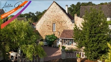 Maison en pierre rénovée avec jardin, atelier et cuisine d’été – Souvigny (03210)