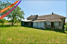 Maison de campagne à vendre à Saint-Léopardin-d’Augy avec dépendances, grange et terrain de 8 200 m²