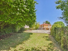 Jardin (38200) - Propriété familiale (196 m2) avec jardin, garage, atelier, piscine et potentiel de valorisation foncière à 5 min de Vienne.