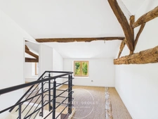 Maison de village familiale – 215 m² habitables – 5 chambres – Cour – Cave – Jardin (38200)