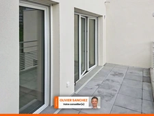 T2 NEUF avec terrasse plein sud – Garage – Ascenseur – Terrasse partagée vue panoramique