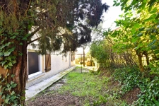 Grande demeure avec jardin et garage