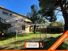 MAISON DES ANNEES 60, PROCHE CENTRE VILLE, JARDIN ET GARAGES.