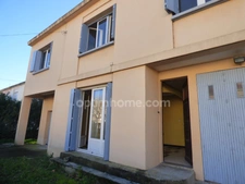 Maison 5 pièces, garages et jardin, à proximité immédiate du centre ville 