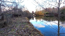 Terrain de 4 445,00 m²  avec étang à MEZIERES SUR OISE (02)