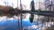 Terrain de 4 445,00 m²  avec étang à MEZIERES SUR OISE (02)