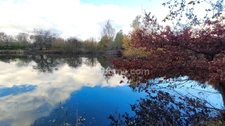 Terrain de 4 445,00 m²  avec étang à MEZIERES SUR OISE (02)