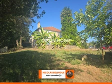 Maison de famille avec beaux volumes et grange attenante