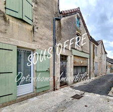 Ensemble immobilier avec maison à restaurer et deux appartements