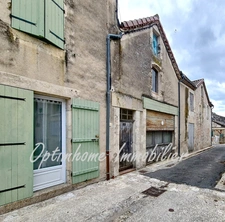 Ensemble immobilier avec maison à restaurer et deux appartements