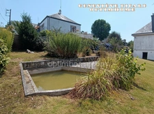 Centre-ville de Pontivy – Maison de 4 pièces avec sous-sol sur 1 500 m² de jardin paysagé en zone UB : un potentiel rare qui fait la différence !