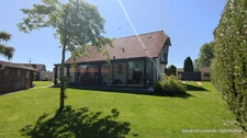 Maison 140 m² – Vie de plain-pied possible – Véranda récente 32 m² – 2 garages – Terrain 807 m² – Saint-Ouen-du-Tilleul