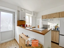 DOLE – Appartement duplex 85 m² – beaux volumes, parking et grande cave