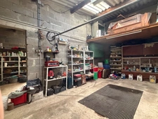 MAISON 2 CHAMBRES AVEC DOUBLE GARAGE ET JARDIN