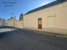 Maison avec jardin, dépendances et garage 