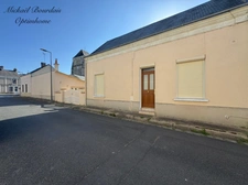 Maison avec jardin, dépendances et garage 