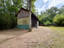 Terrain de loisirs de 4 900 m² avec hangar et espace habitable