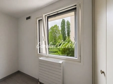 78 MONTIGNY-LE-BRETONNEUX – Le Pas du Lac area - 2-bedroom apartment of 74.45 m² with balcony, parking and garden view
