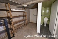 Maison composée de deux parties d’habitation avec grand garage à Kergrist-Moëlou