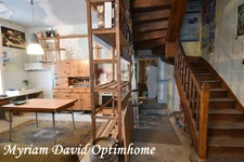 Maison composée de deux parties d’habitation avec grand garage à Kergrist-Moëlou