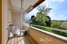 YZERON - Agréable appartement grand T3 avec balcon et vue  + stationnement dans garage fermé