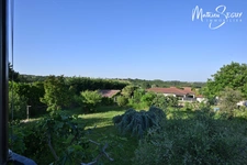 Grande maison P7 sur un grand terrain au coeur de SAINT JEAN DE TOUSLAS