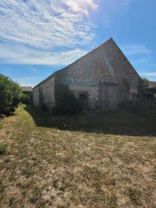 Belle grange de 234 m² sur un terrain bâtissable de 1207 m²