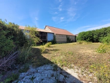 Belle grange de 234 m² sur un terrain bâtissable de 1207 m²